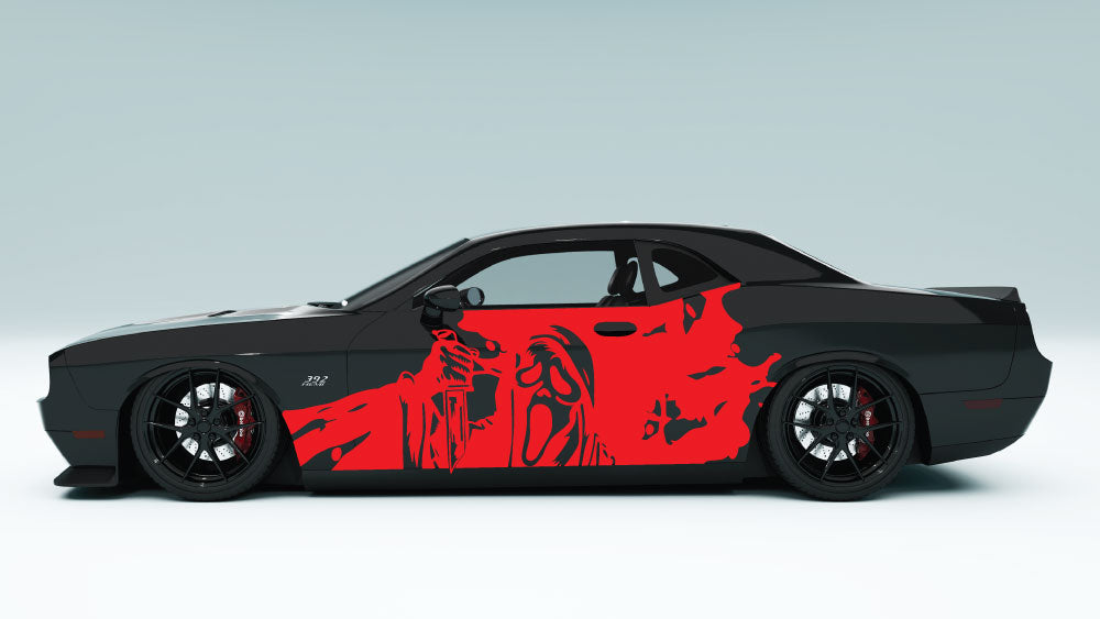 Wet installation method in progress – applying Ghost Face decal on vehicle panel