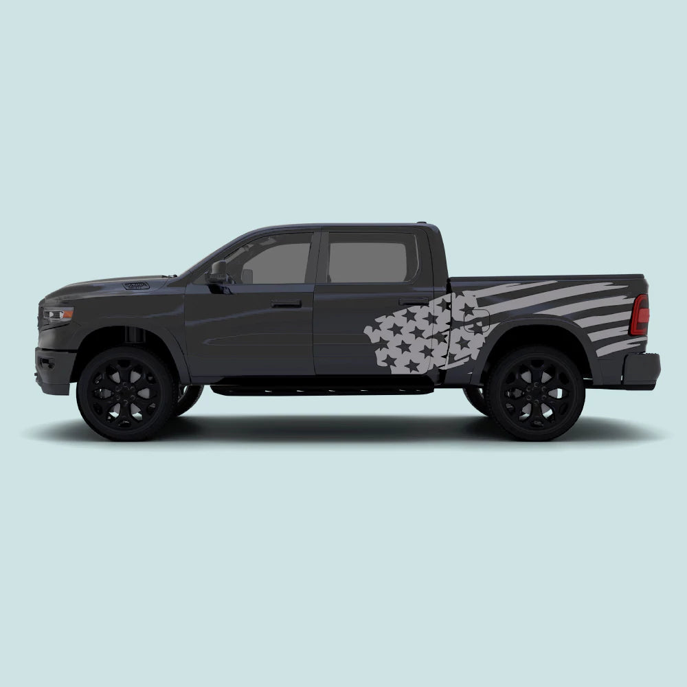 2019–present Ram 1500 with grey USA flag side decals across the rear doors and truck bed
