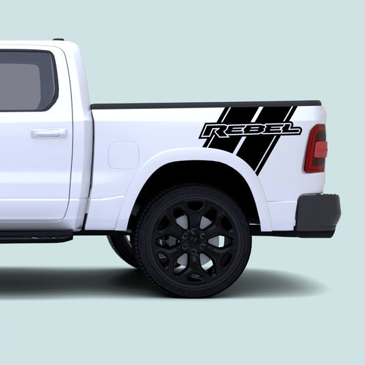 2019–present Ram 1500 with black Rebel side bed stripe decal kit and REBEL text vinyl graphics