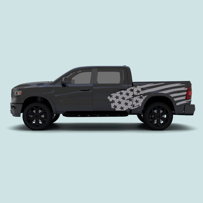 2019–present Ram 1500 with grey USA flag side decals across the rear doors and truck bed